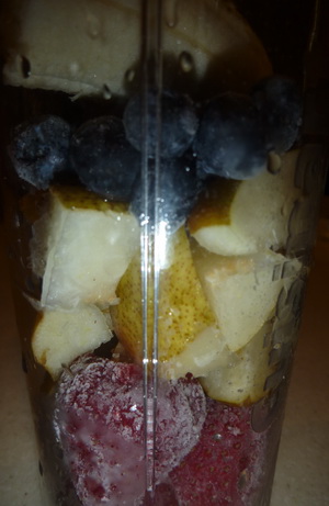 Flash frozen strawberries we picked this summer with fresh pears, blueberries and banana